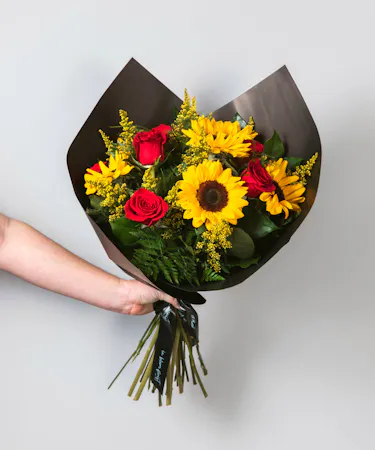Surprise that special someone with a beautiful mixed floral wrap!