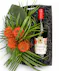 Your choice of wine, a variety of cocktail mixers, a pair of Sugarfina candy and chocolates, and a wine opener set.