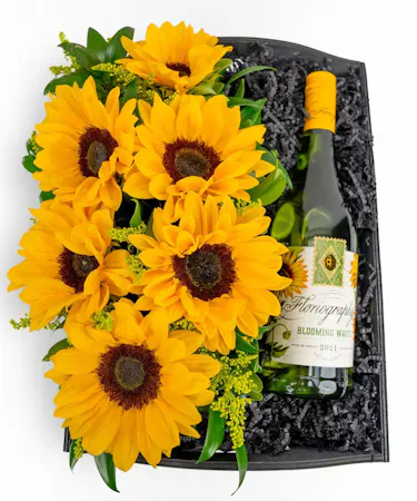 Your choice of wine, a variety of cocktail mixers, a pair of Sugarfina candy and chocolates, and a wine opener set.