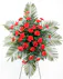 Beautiful red carnations against a lush greenery backdrop will be beautifully showcased during the final farewell service. 