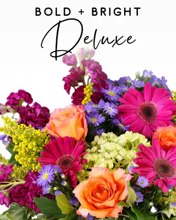 Our expert designers will hand pick fresh floral in bright & bold tones to create a one-of-a-kind custom arrangement. 