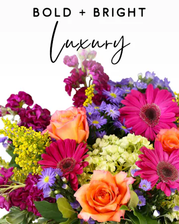 Our expert designers will hand pick fresh floral in bright & bold tones to create a one-of-a-kind custom arrangement. 