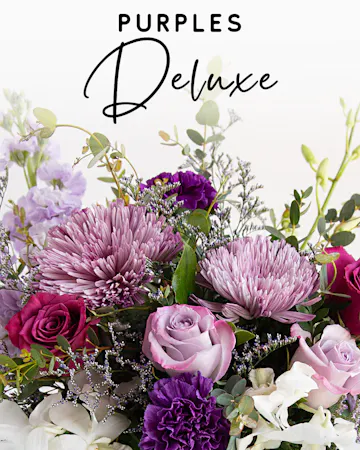 Our expert designers will hand pick fresh floral in purple hues to create a one-of-a-kind custom arrangement. 