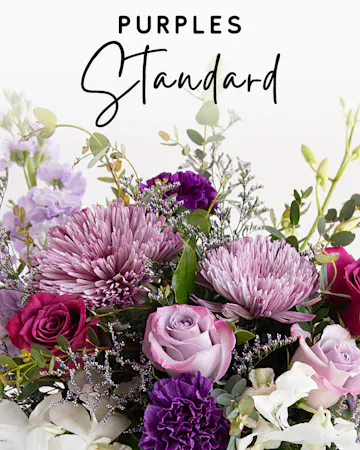 Our expert designers will hand pick fresh floral in purple hues to create a one-of-a-kind custom arrangement. 