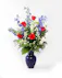 A striking display of red, white, and blue patriotic petals that will deliver your condolences to the bereaved.