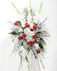 Incorporating colors of the American flag, this arrangement is sure to honor the brave soldier who fought for freedom and those who have a deep affection for our country.