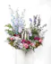 Remember your loved ones with this Elegance of Earth arrangement meant to surround an urn, photo, or memorabilia of the deceased