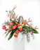 The cremation urn can be surrounded by tropical flowers to showcase a true celebration of life for them.