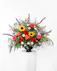 A stylish tribute of brilliant flowers ideal for the funeral home, service, or home. 