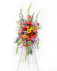 A showcase of colorful blooms in the shape of a cross that can be displayed in front of the service.
