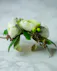 Perfect for Prom or Homecoming! This traditional boutonniere of italian ruscus, and an elegant white rose is the perfect accessory to your special day.