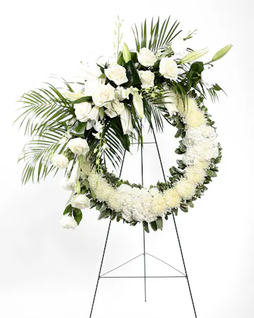 This traditional funeral wreath will deliver your condolences, while creating a time-honored addition when displayed on an easel for a wake or funeral service