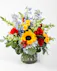 Vibrant and captivating, the Colorful Love arrangement bursts with colors and is a beautiful way to show your love to a friend, family member, or loved one.