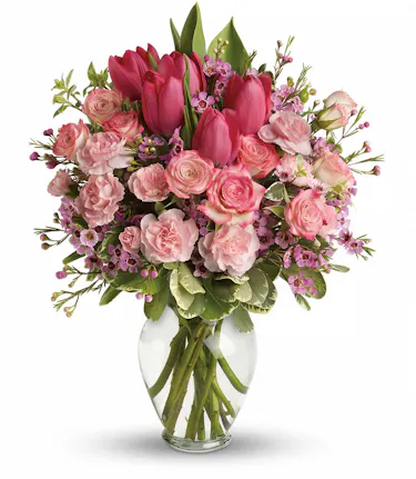 pink flower arrangement with roses, tulips, and carnations