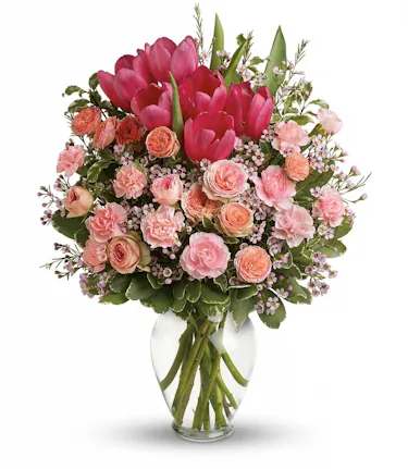 pink flower arrangement with roses, tulips, and carnations