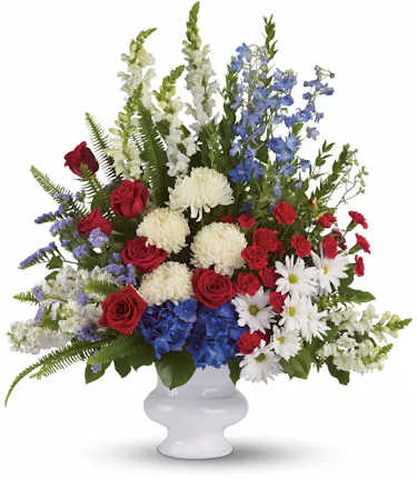 patriotic flowers in tall tribute urn