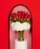 A modern twist on this bouquet of 36 long stem roses when we accent them with heavenly hydrangea and hypericum berries and arrange them in a bubble bowl. 