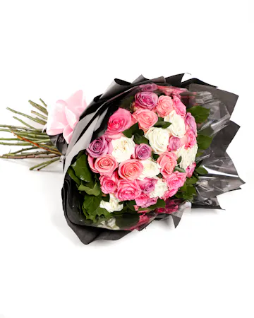 3 Dozen long stem wrapped rose bouquet tied with a ribbon